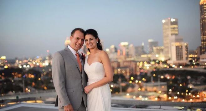 Mike Bettes and Allison Chinchar during their wedding.